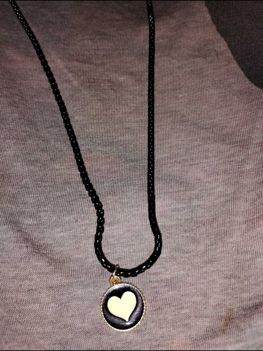 Black Pendant Necklace with Cream Heart Accent